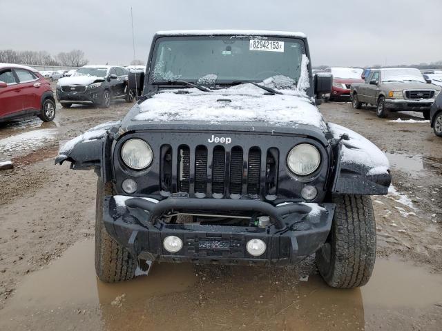 2014 Jeep Wrangler Unlimited Sahara - Фото 5