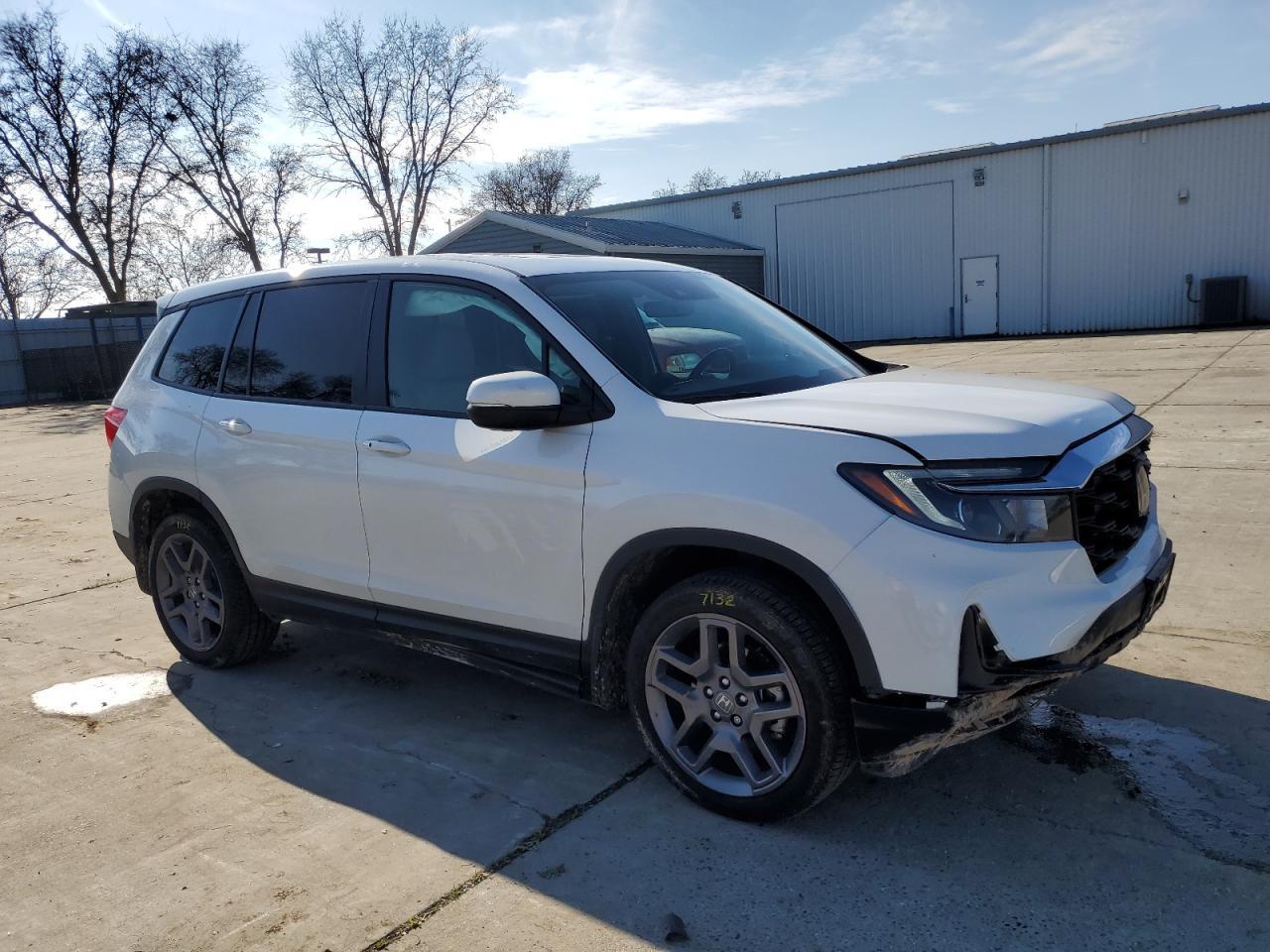 2023 HONDA PASSPORT E - Image 4