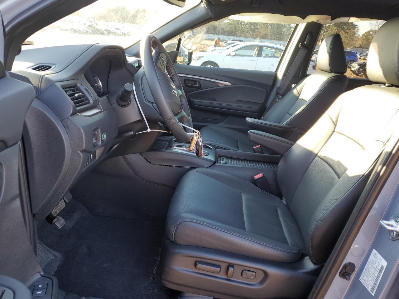 2023 HONDA PASSPORT E - Image 7