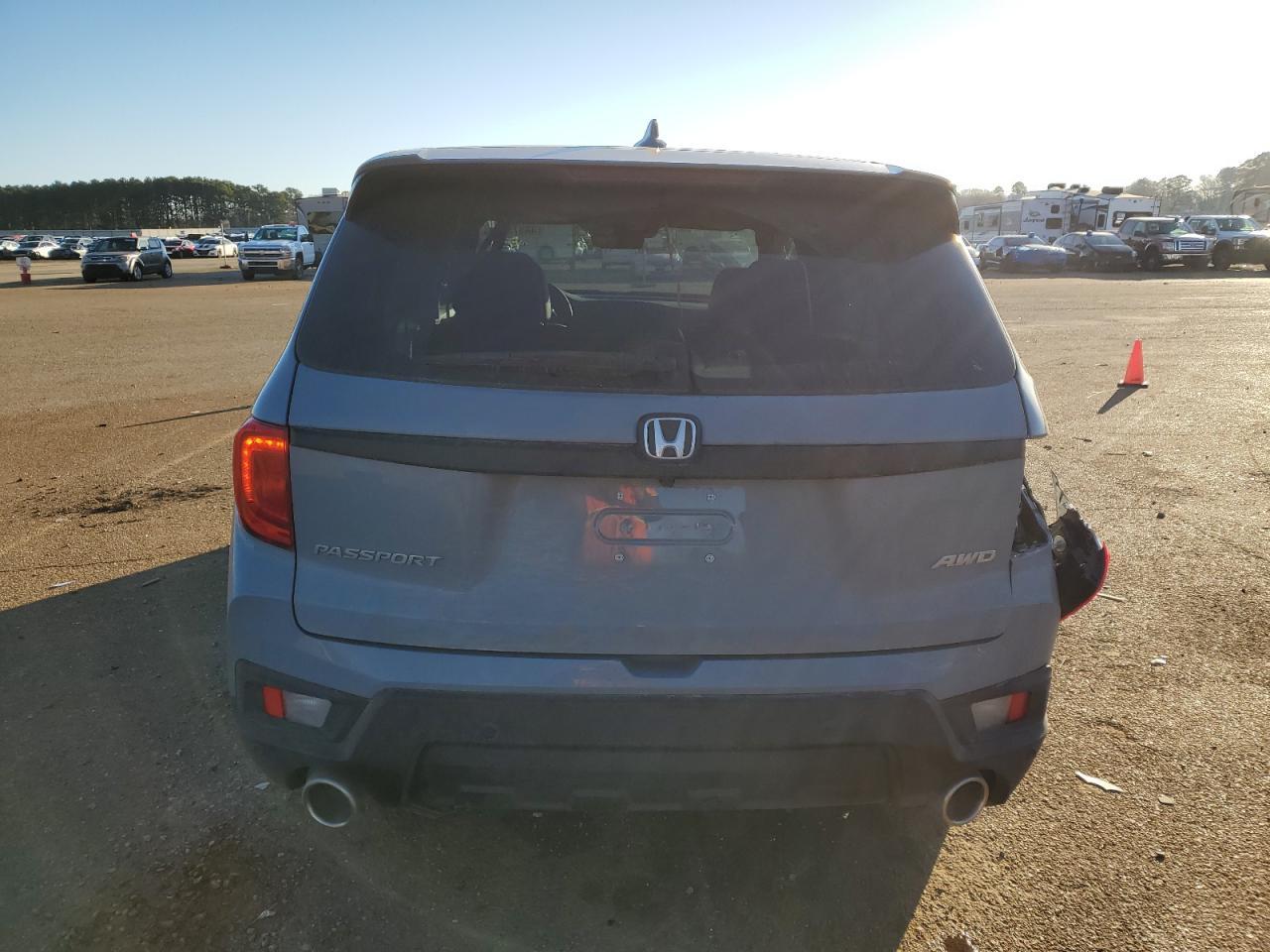2023 HONDA PASSPORT E - Image 6