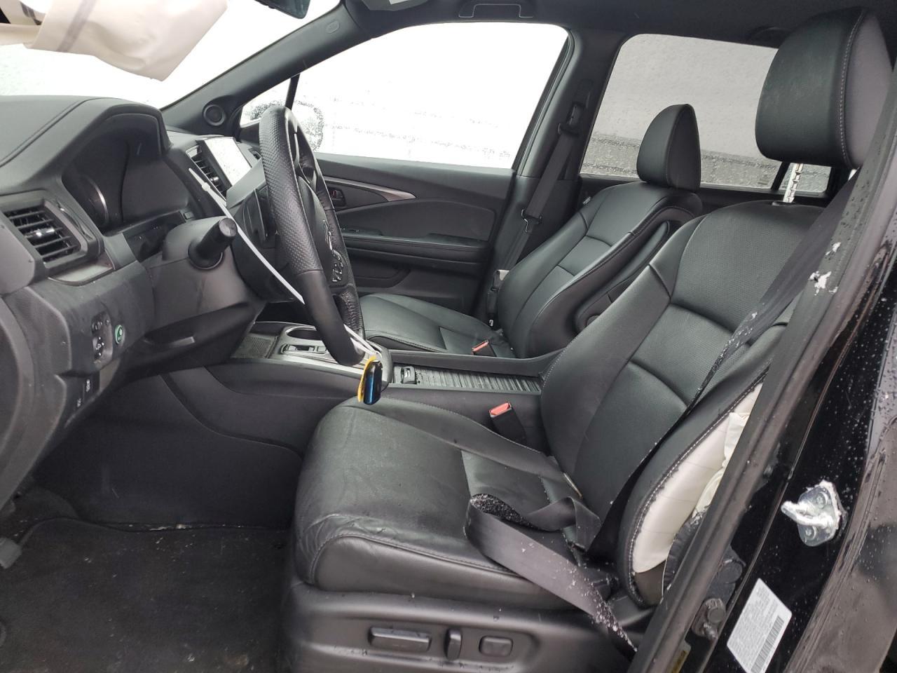 2023 HONDA PASSPORT E - Image 7