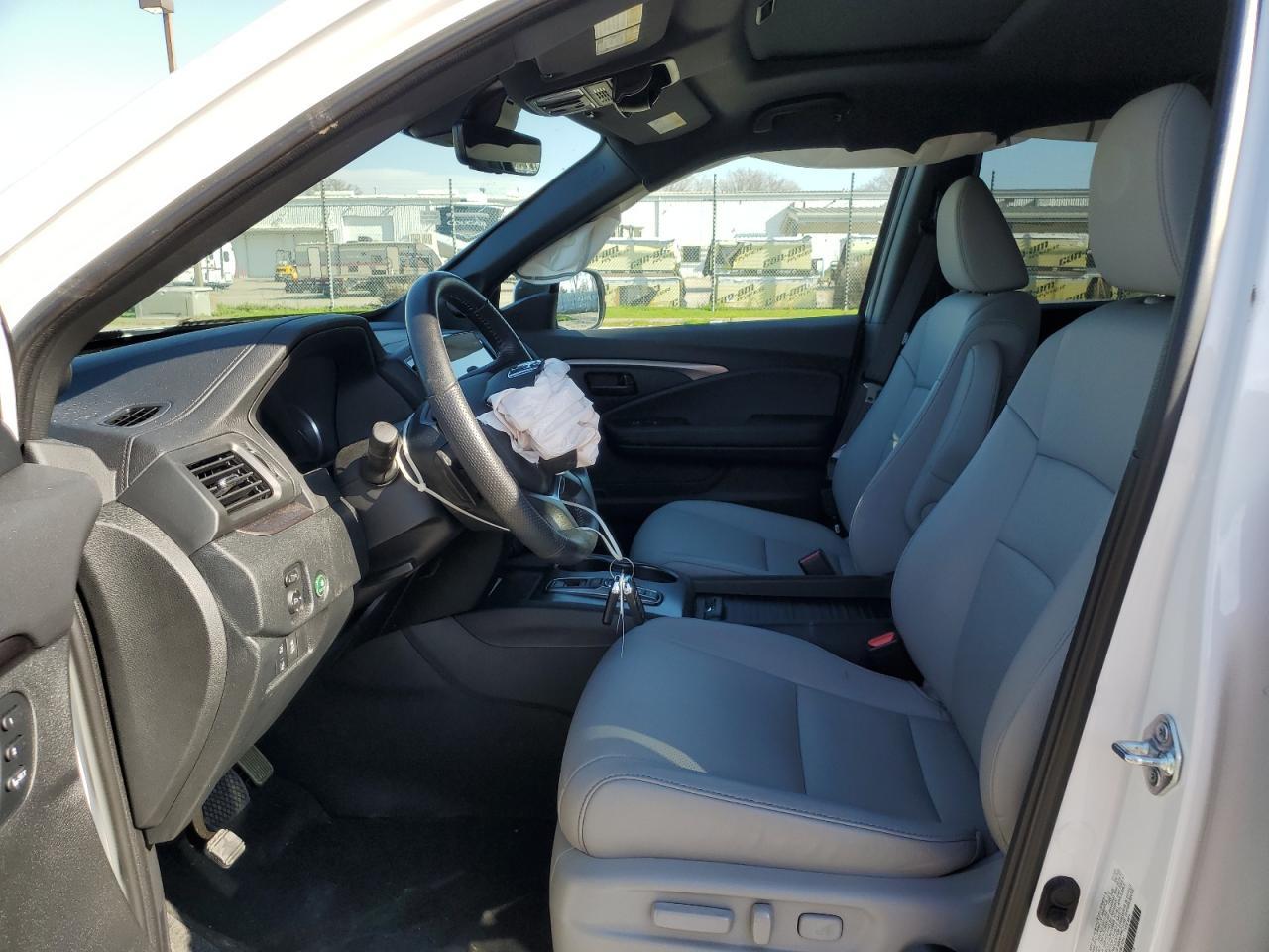 2023 HONDA PASSPORT E - Image 7