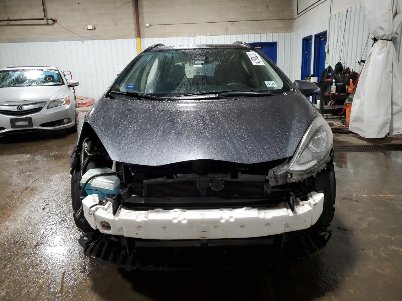 2019 TOYOTA PRIUS C - Фото 5