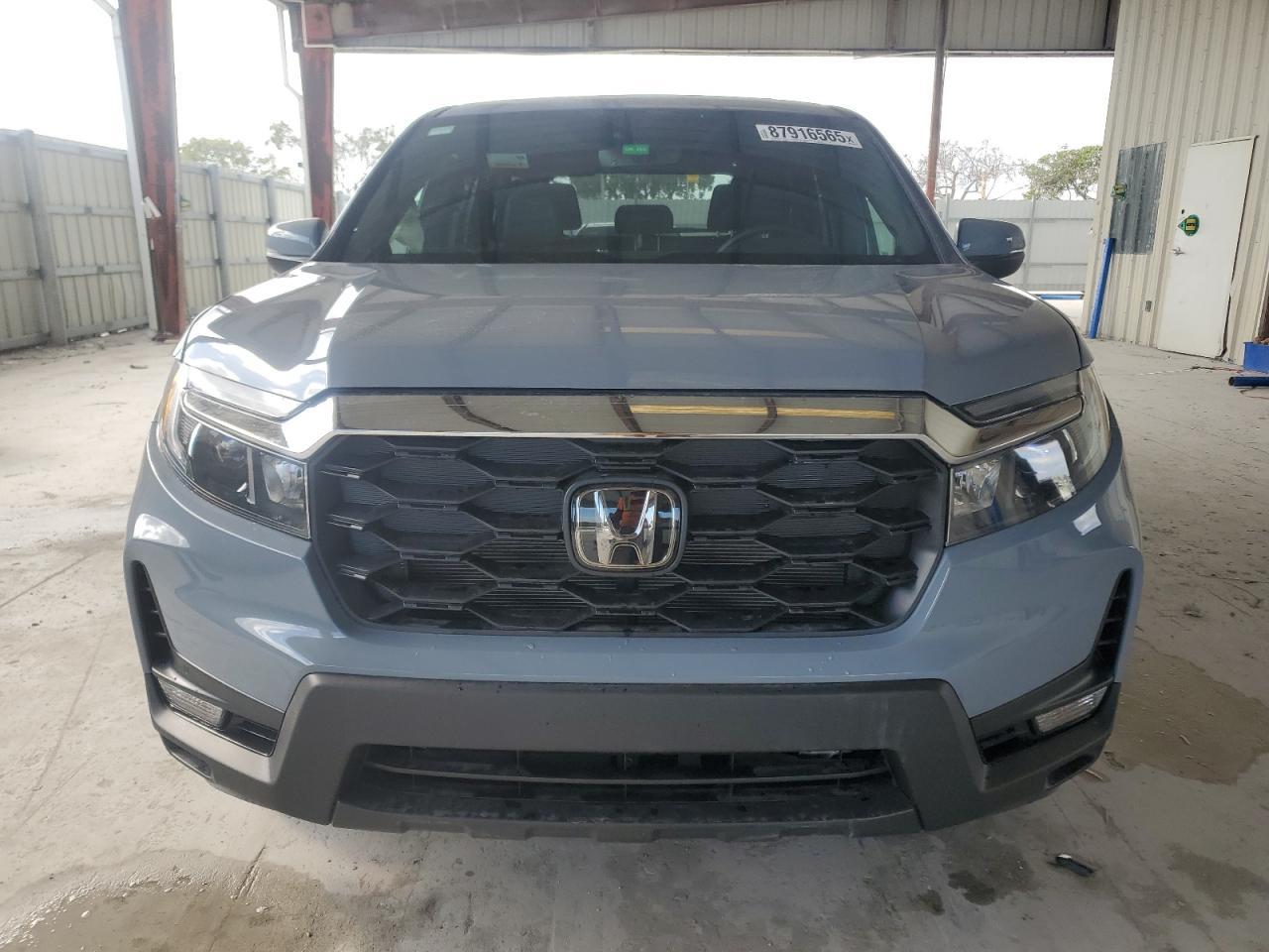 2023 HONDA PASSPORT E - Фото 5