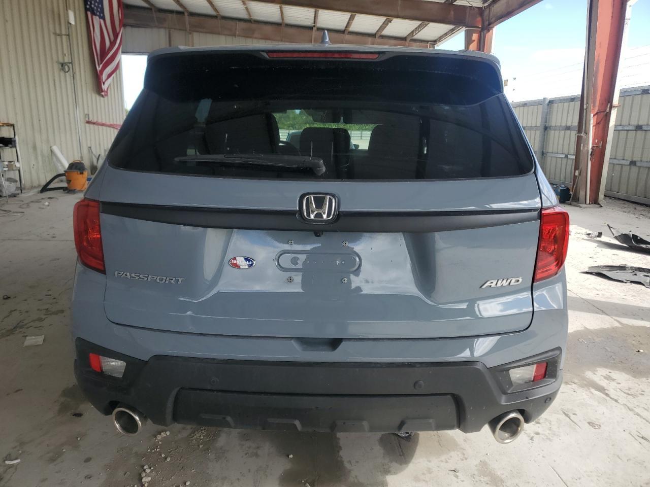 2023 HONDA PASSPORT E - Фото 6