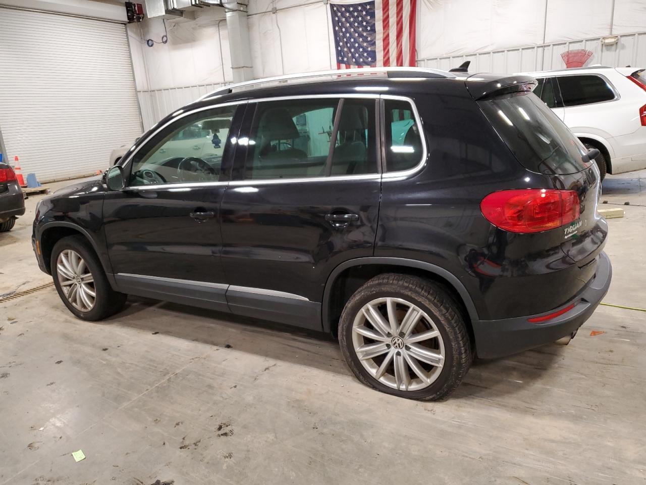 2014 VOLKSWAGEN TIGUAN S - Фото 2