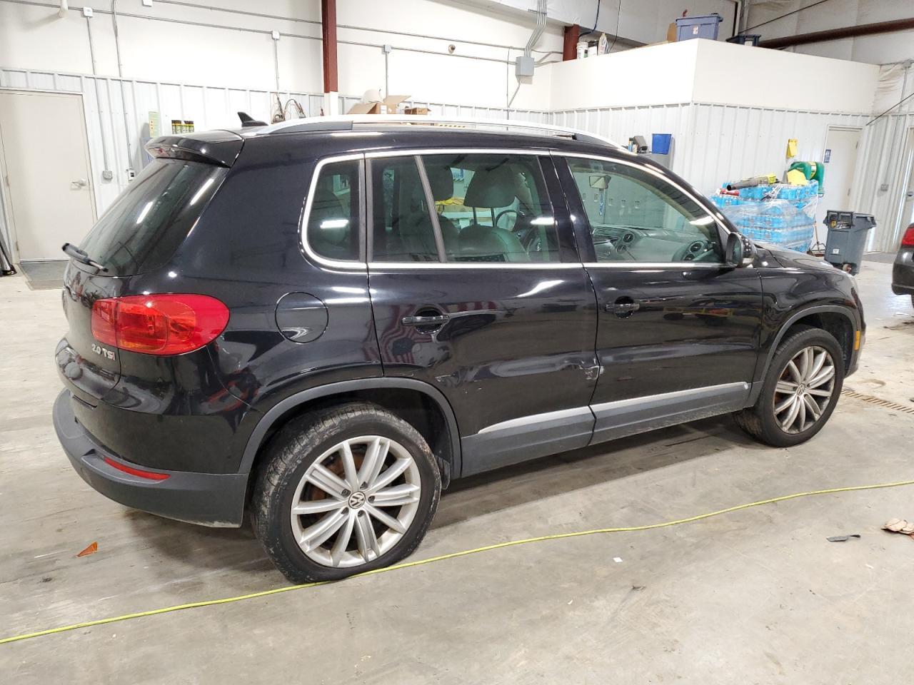 2014 VOLKSWAGEN TIGUAN S - Фото 3