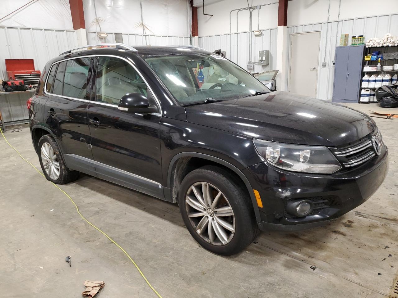 2014 VOLKSWAGEN TIGUAN S - Фото 4