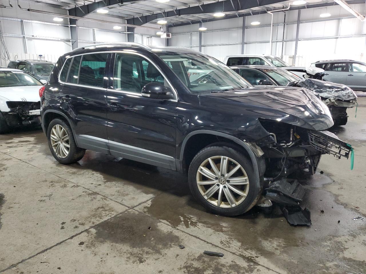 2014 VOLKSWAGEN TIGUAN S - Фото 4