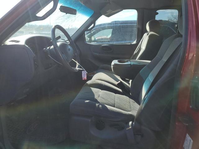 2002 Ford F150 - Фото 7