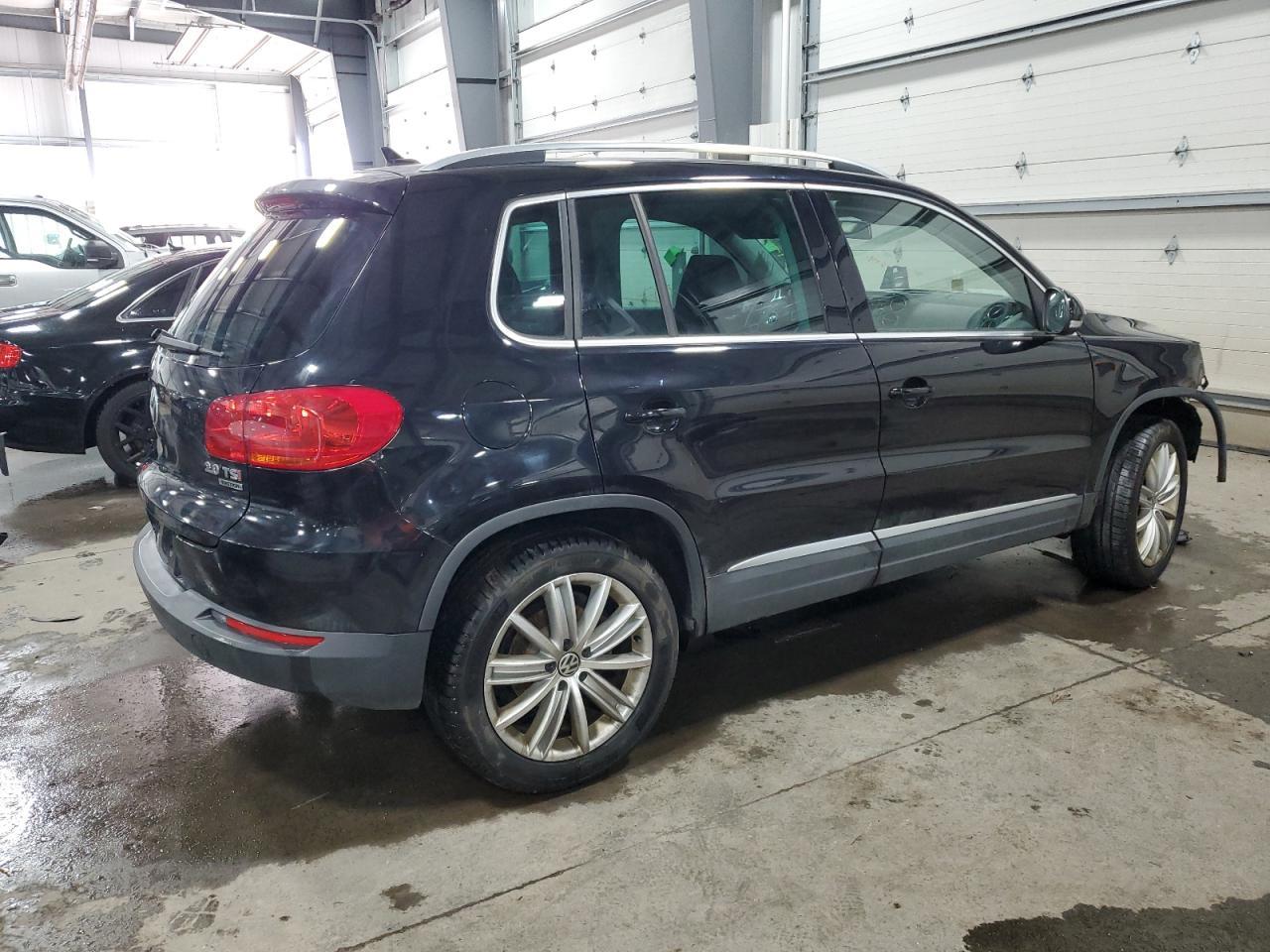 2014 VOLKSWAGEN TIGUAN S - Фото 3
