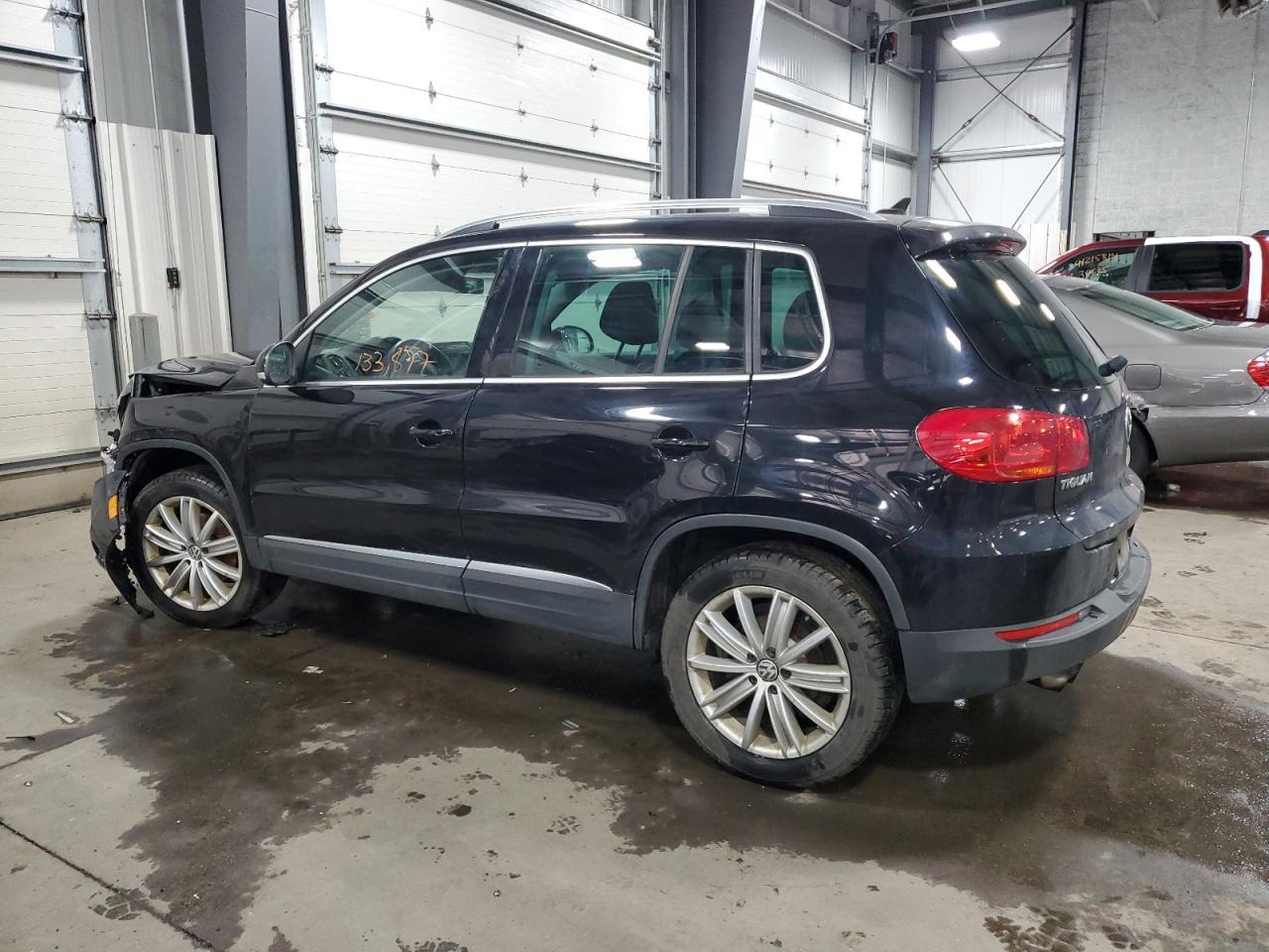 2014 VOLKSWAGEN TIGUAN S - Фото 2