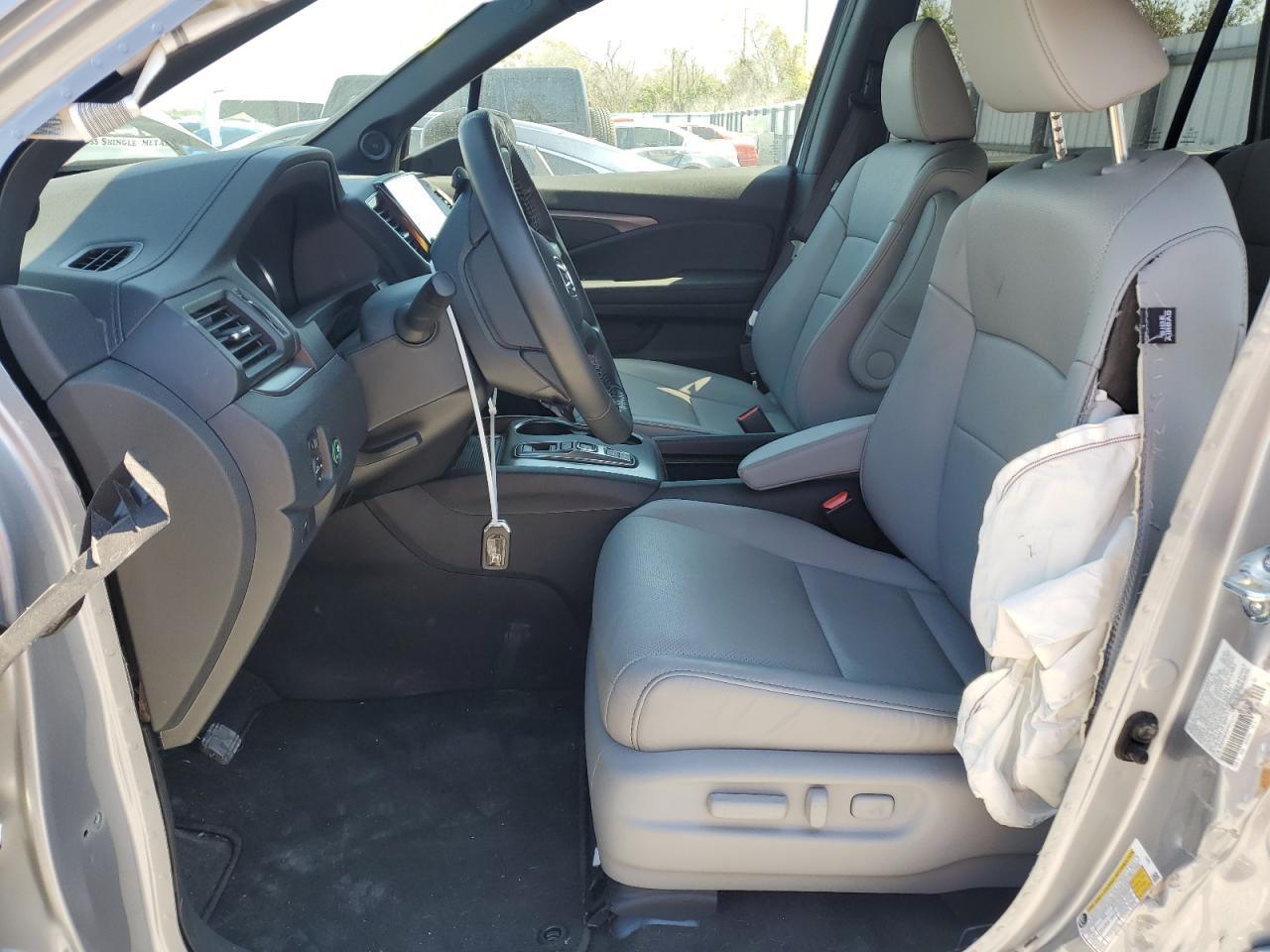 2023 HONDA PASSPORT E - Image 7