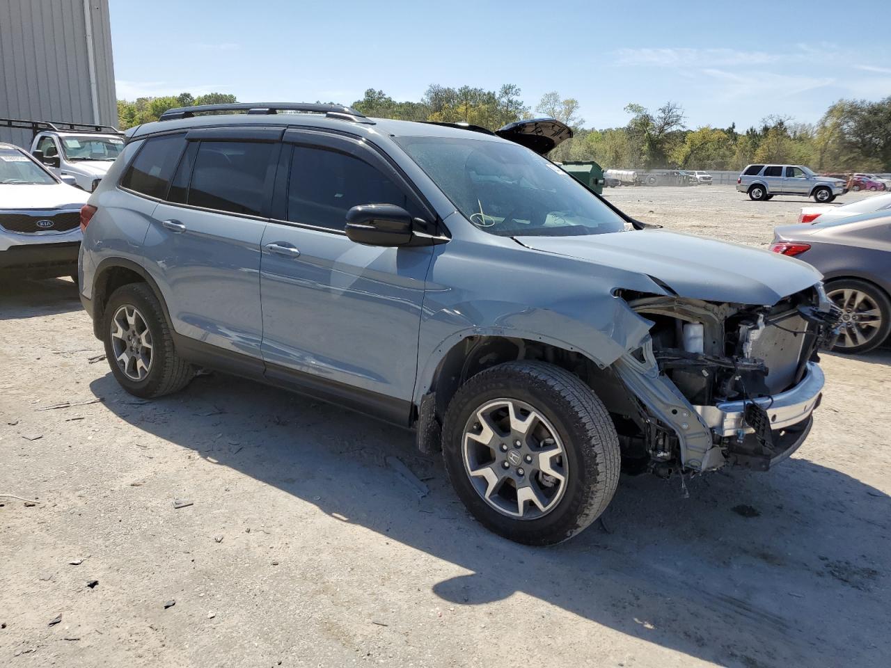 2023 HONDA PASSPORT T - Image 4