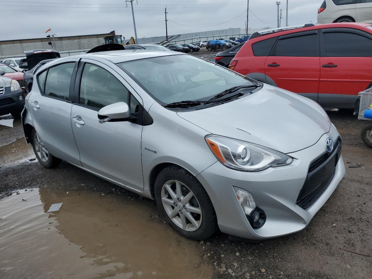 2016 TOYOTA PRIUS C - Фото 4