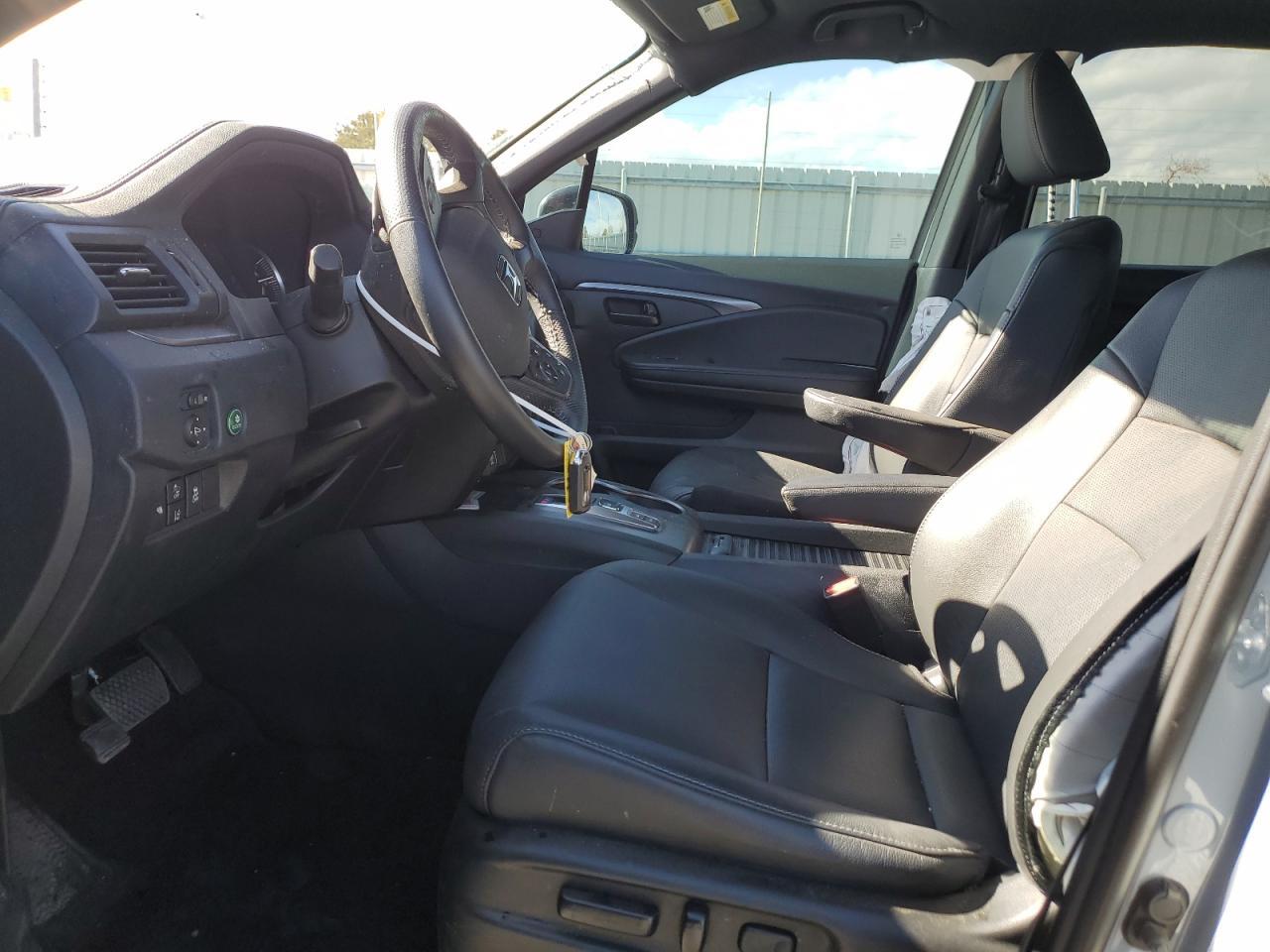 2023 HONDA PASSPORT E - Image 7