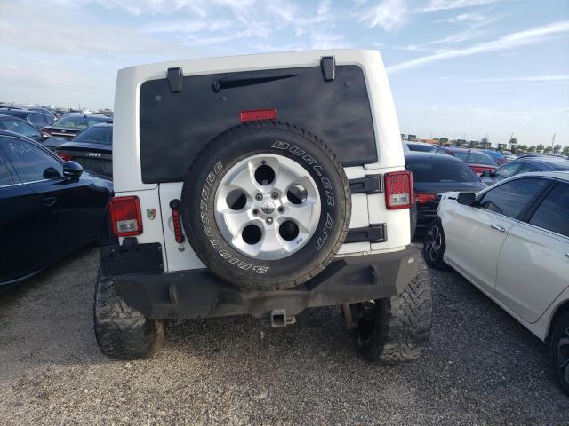 2014 Jeep Wrangler Unlimited Sahara - Фото 6