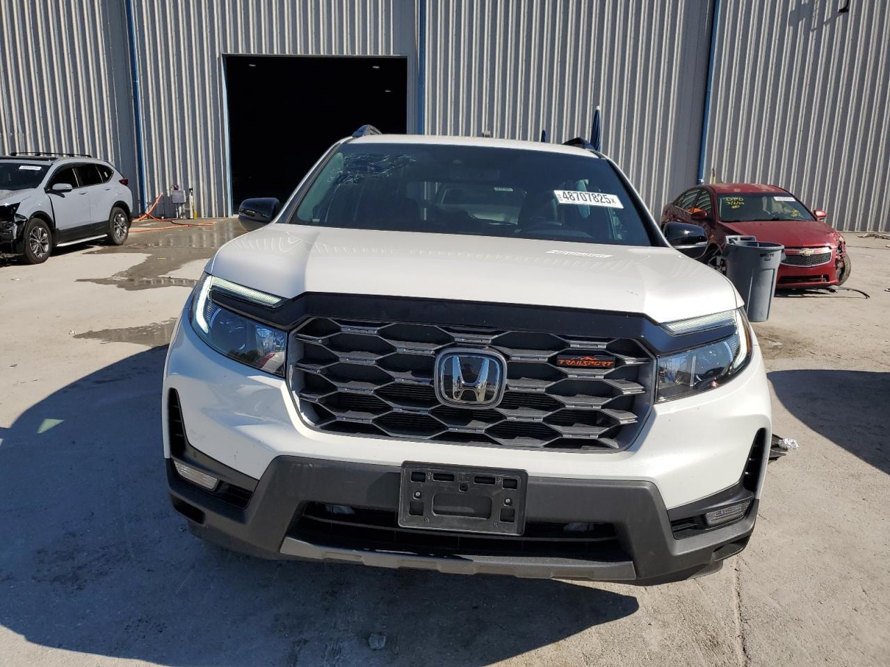 2023 HONDA PASSPORT T - Фото 5