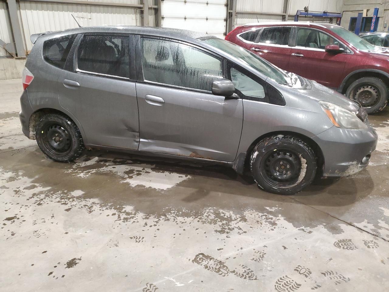 2011 HONDA FIT SPORT - Фото 4