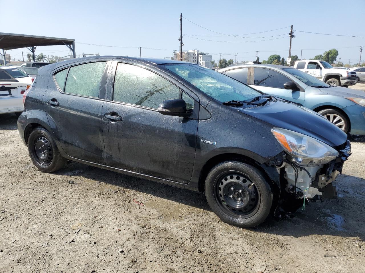 2015 TOYOTA PRIUS C - Фото 4