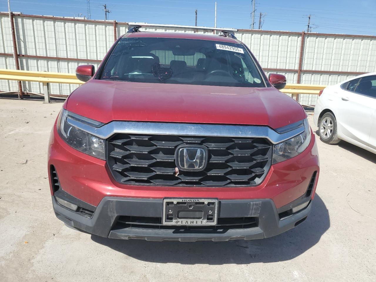 2023 HONDA PASSPORT E - Фото 5