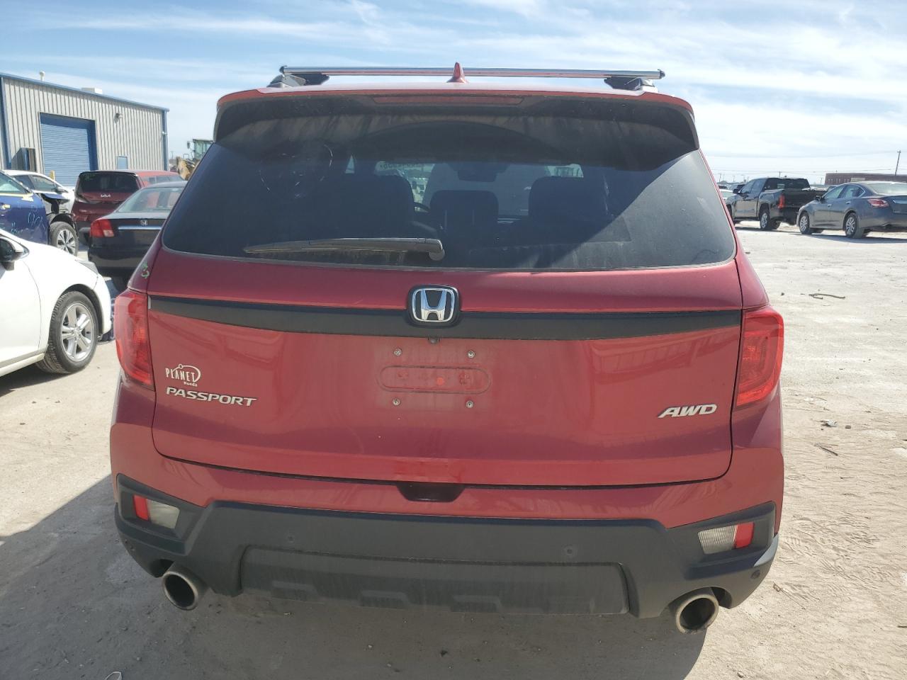 2023 HONDA PASSPORT E - Фото 6