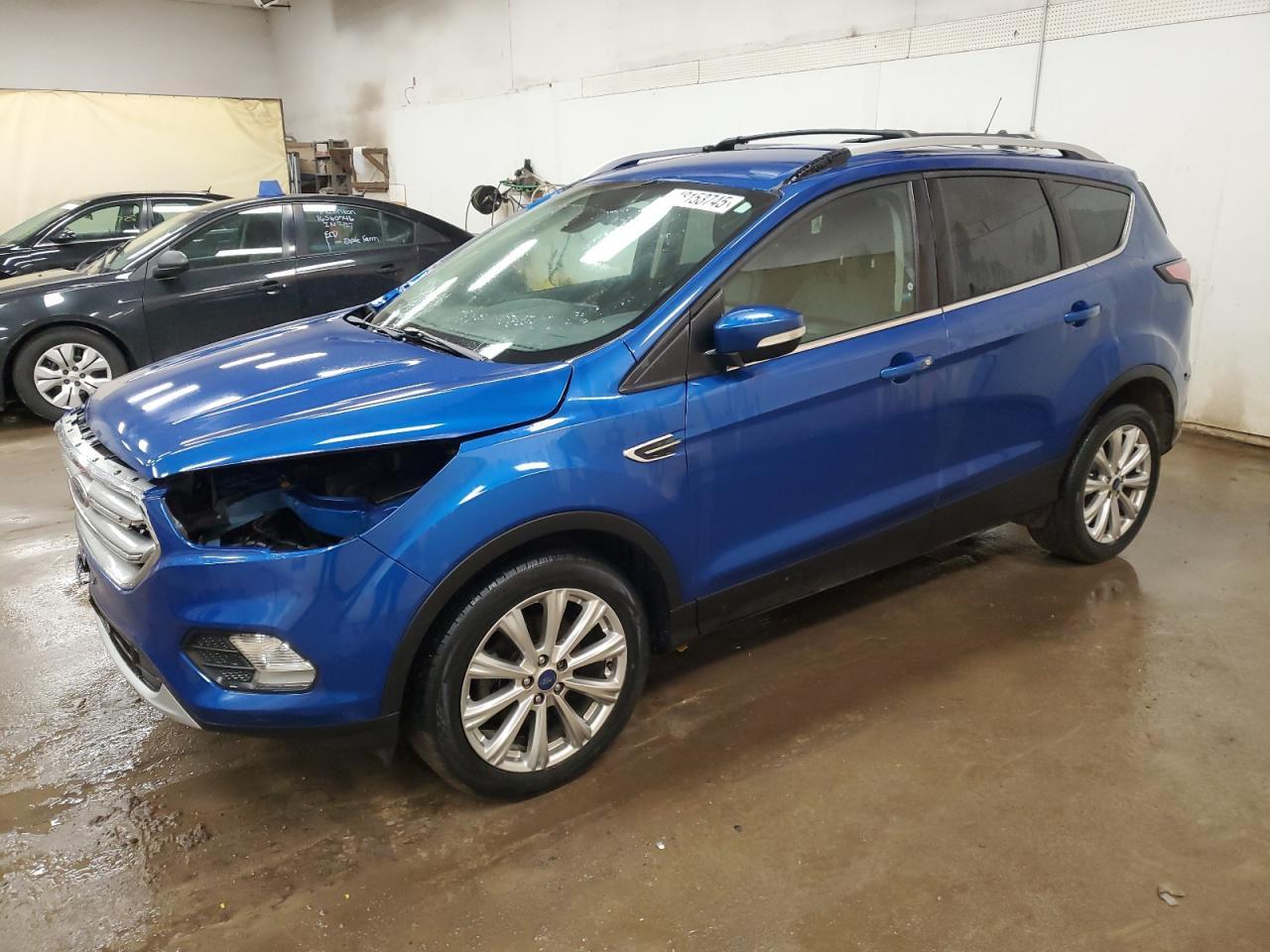 2017 FORD ESCAPE TIT