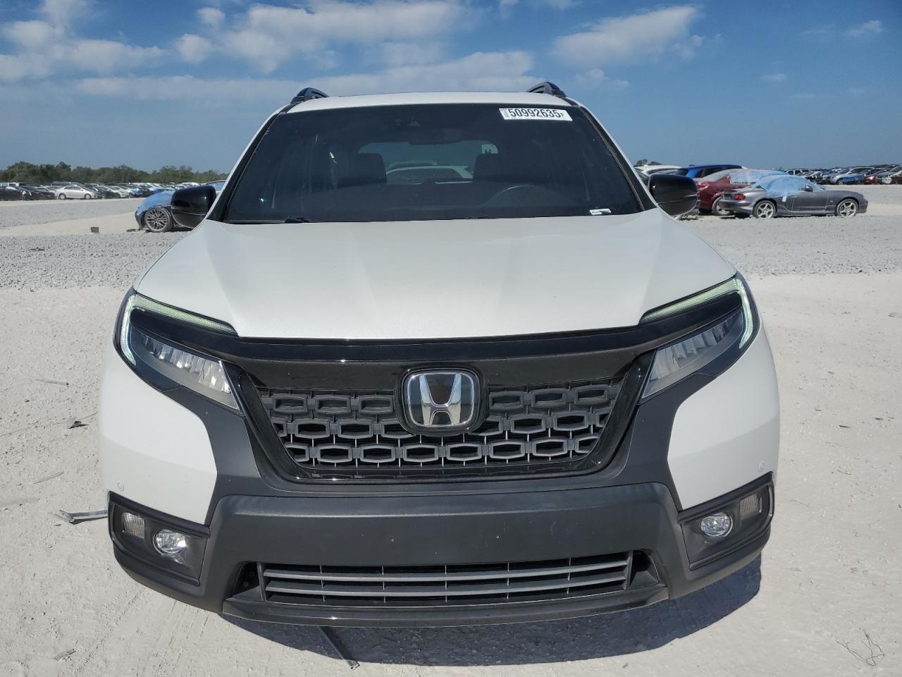 2019 HONDA PASSPORT E - Image 5
