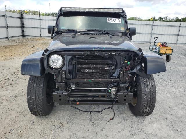 2015 Jeep Wrangler Unlimited Sahara - Фото 5