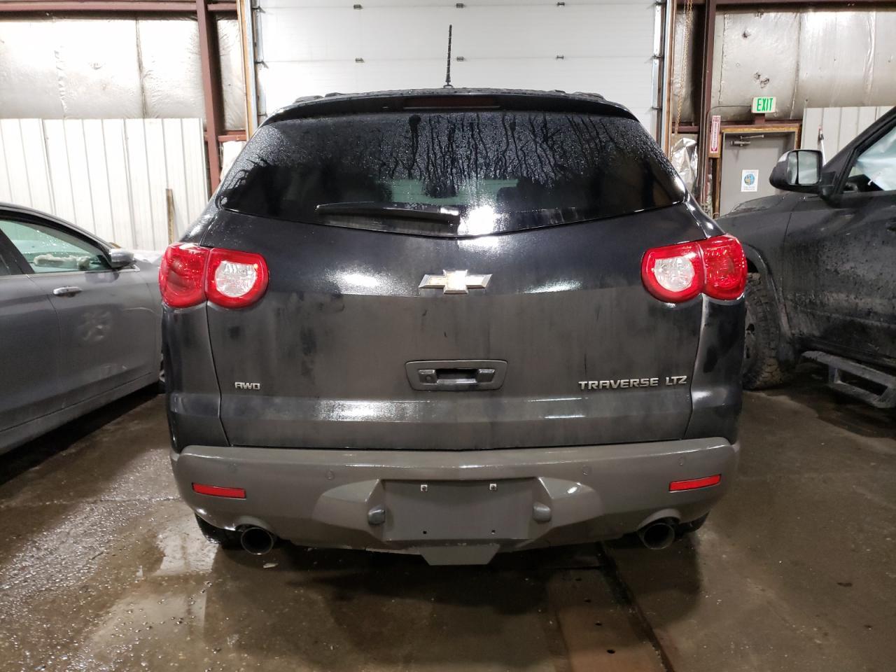 2011 CHEVROLET TRAVERSE L - Фото 6