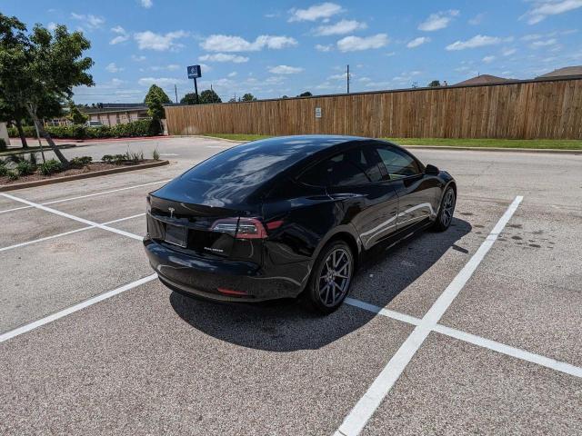 2022 Tesla Model 3 - Фото 4