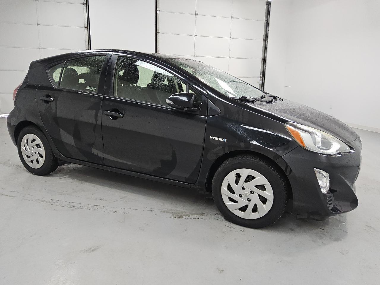 2016 TOYOTA PRIUS C - Фото 4