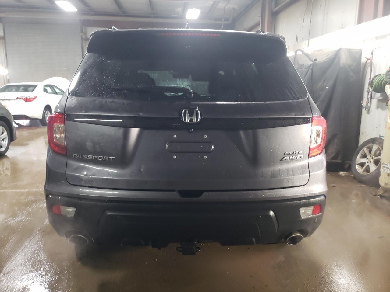 2019 HONDA PASSPORT E - Фото 6