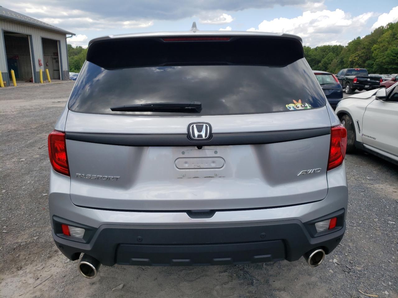 2023 HONDA PASSPORT E - Фото 6
