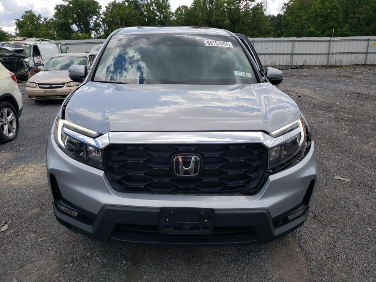 2023 HONDA PASSPORT E - Фото 5