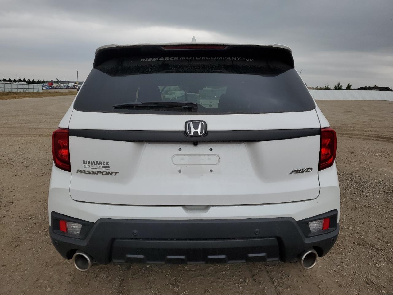 2023 HONDA PASSPORT E - Фото 6