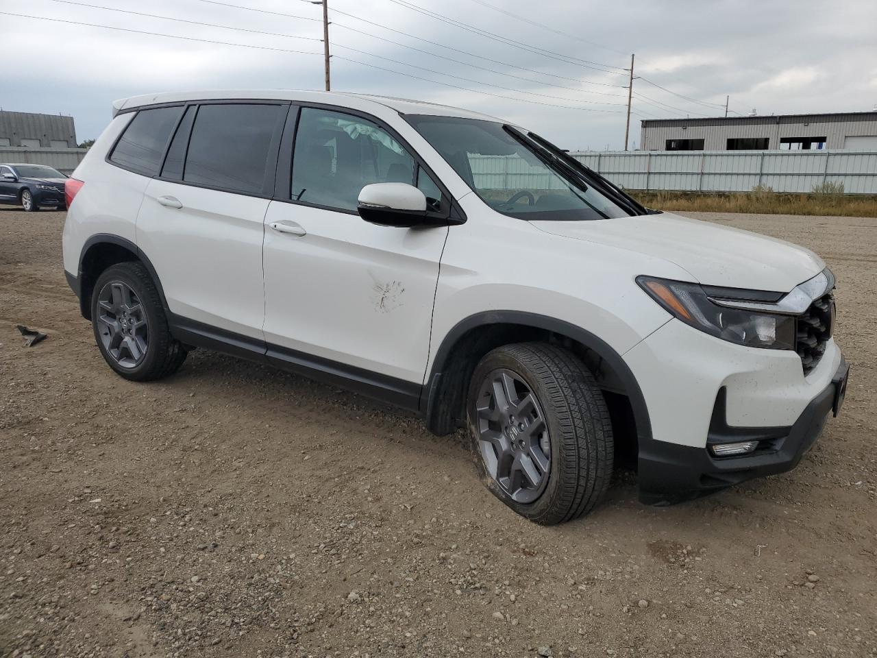 2023 HONDA PASSPORT E - Фото 4