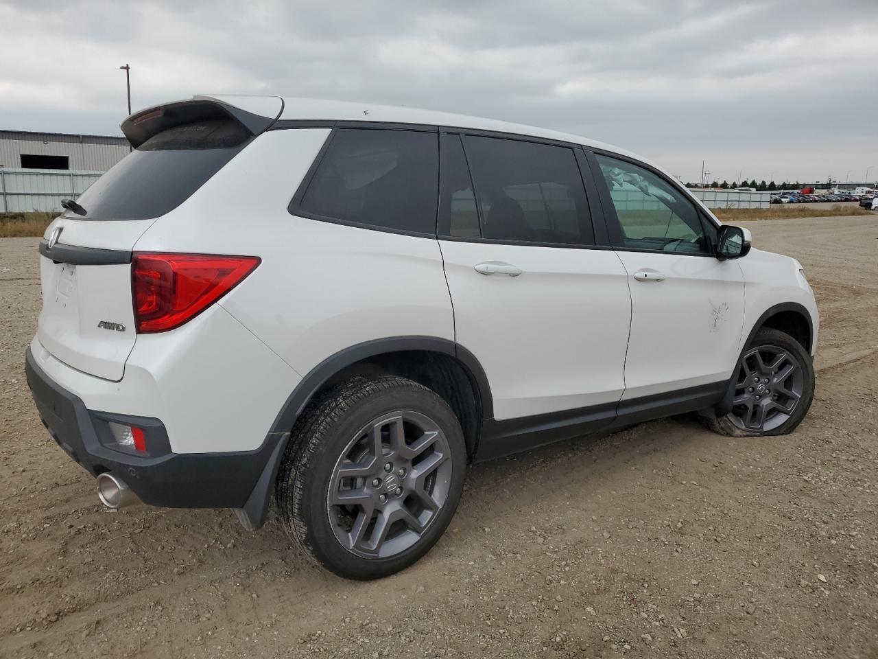 2023 HONDA PASSPORT E - Фото 3