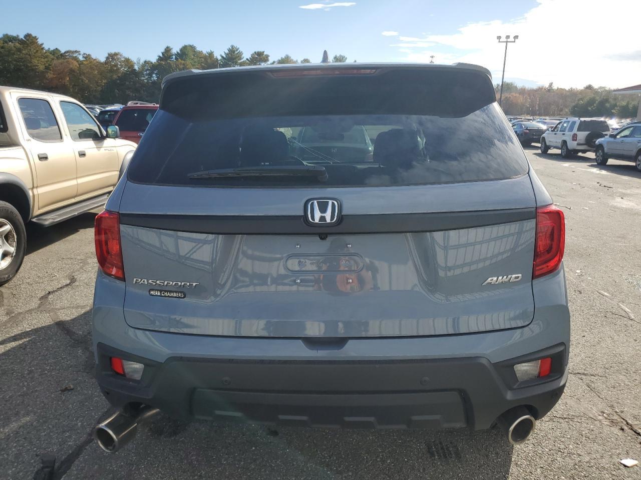 2023 HONDA PASSPORT E - Image 6