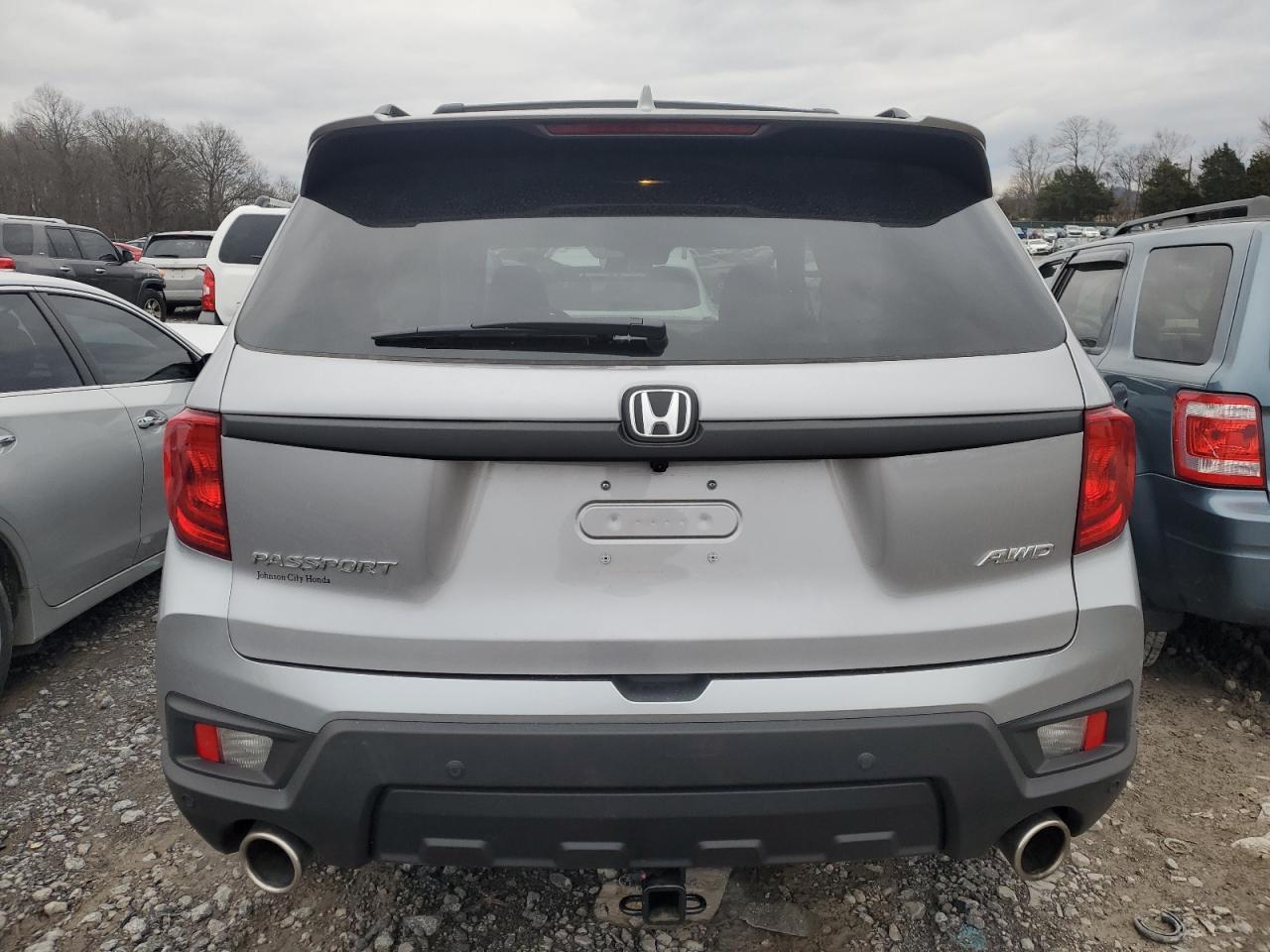 2023 HONDA PASSPORT E - Фото 6