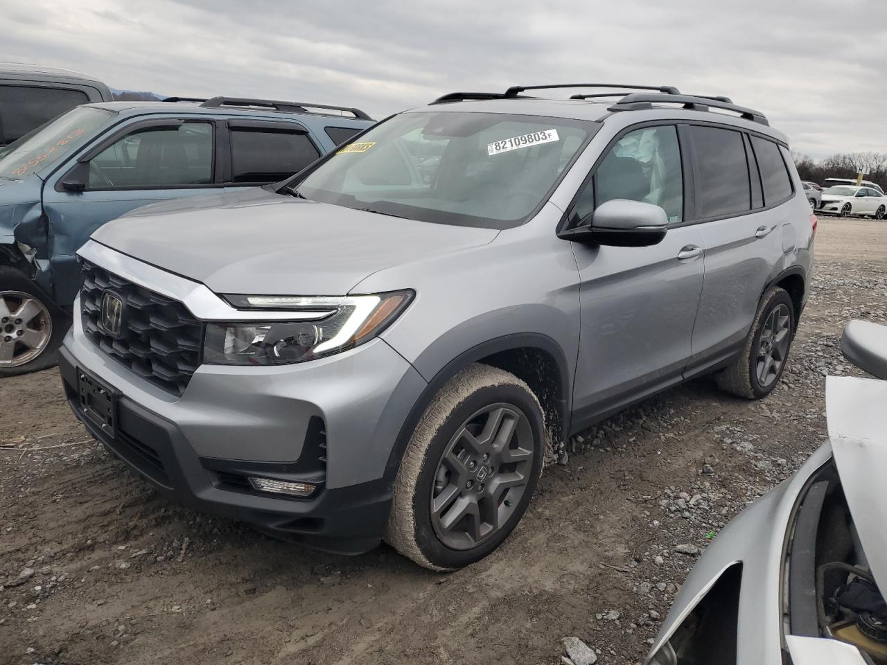 2023 HONDA PASSPORT E car image