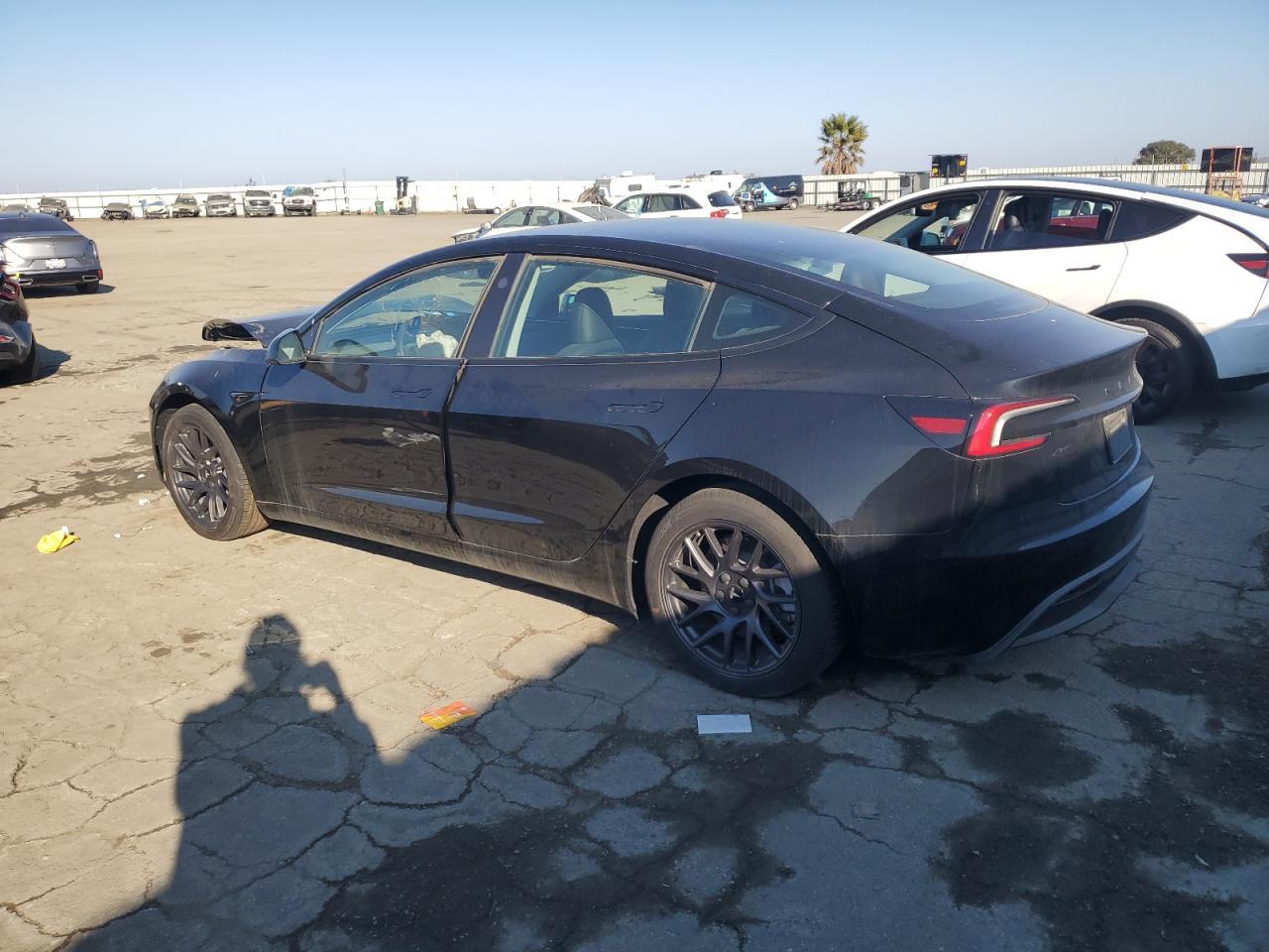 2024 Tesla Model 3 - Фото 2