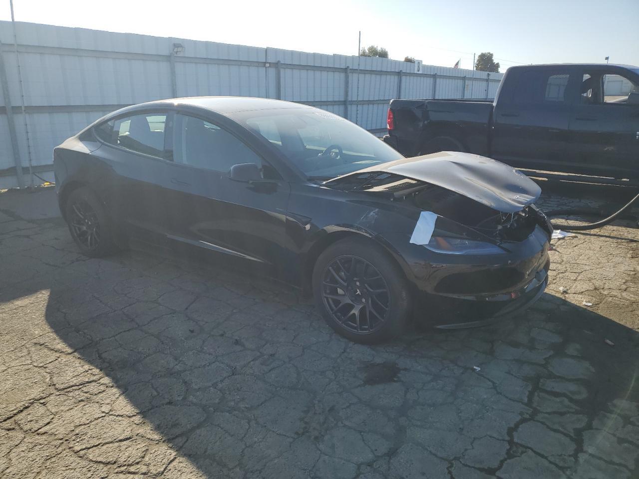2024 Tesla Model 3 - Фото 4