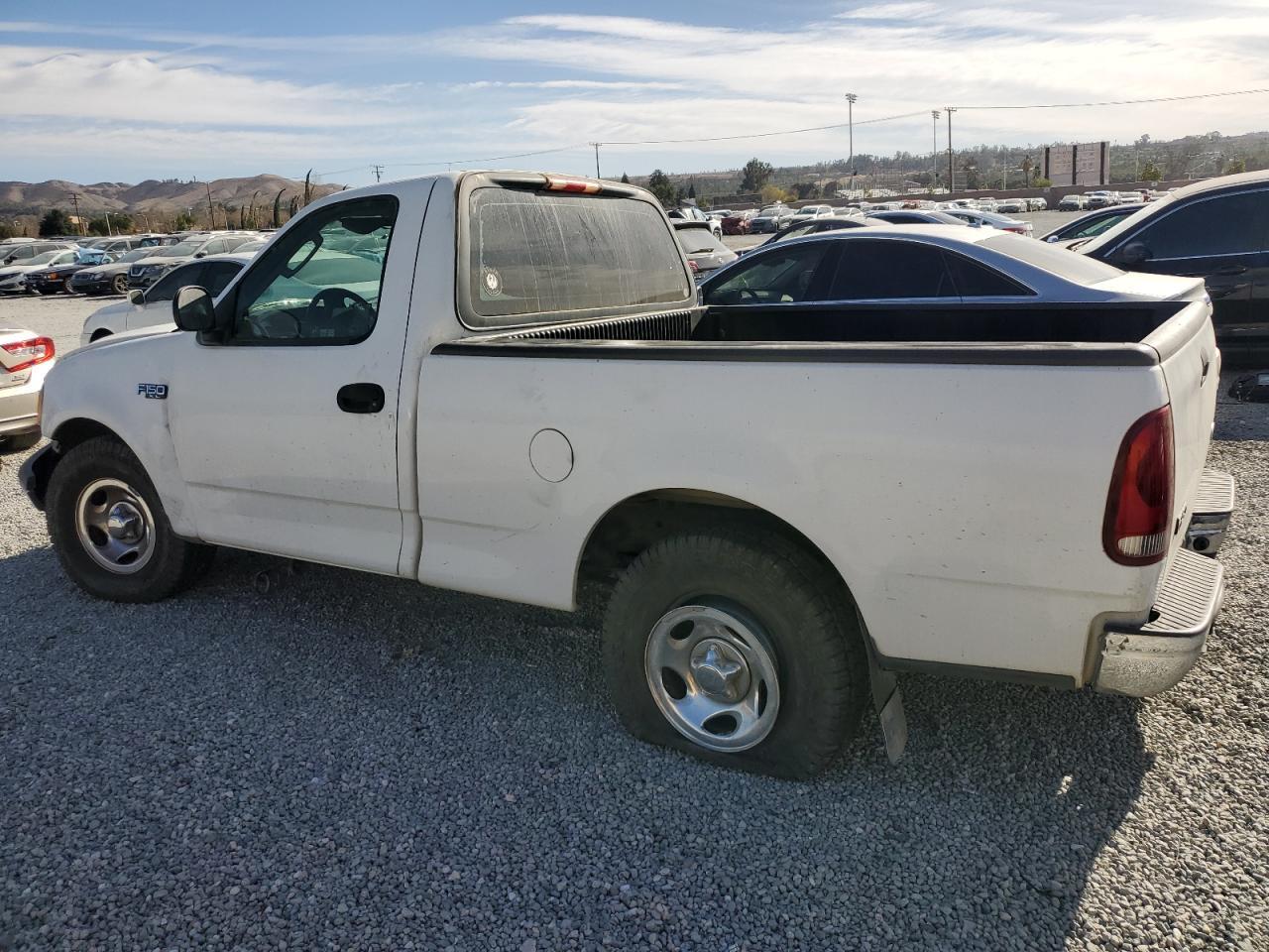 2003 Ford F150 - Фото 2