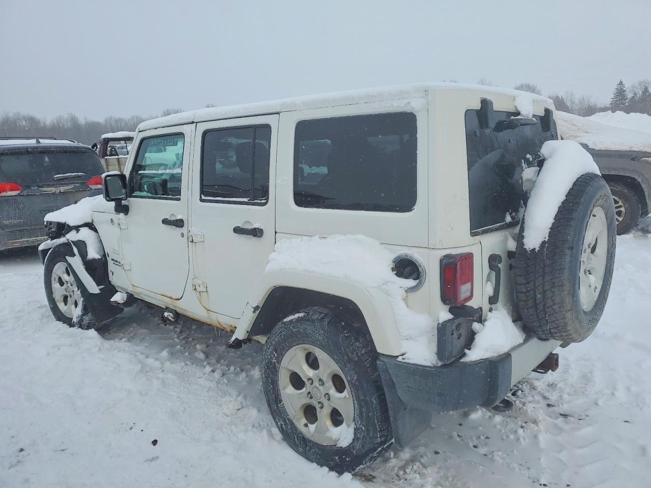 2014 Jeep Wrangler Unlimited Sahara - Фото 2