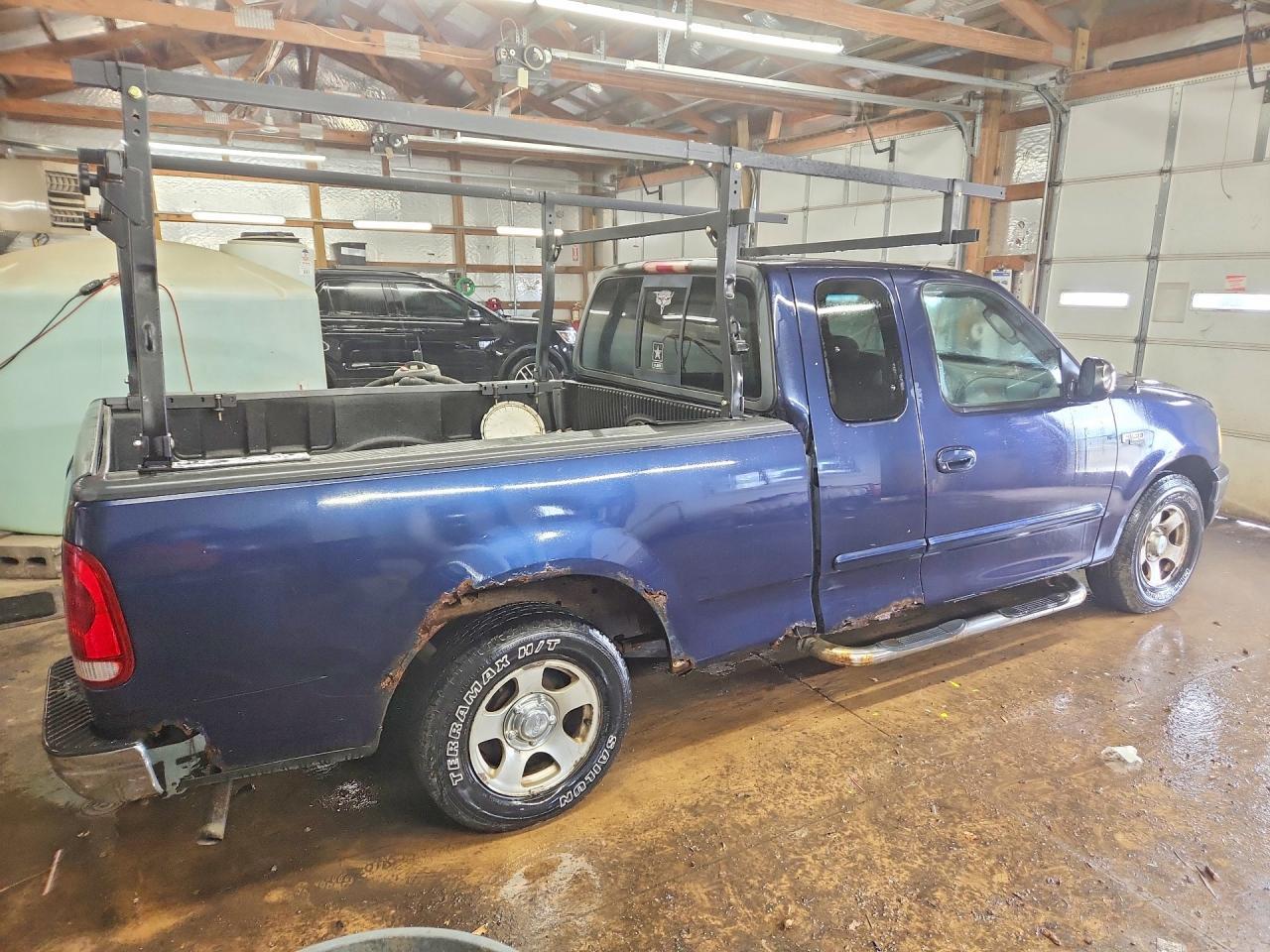 2002 Ford F150 - Фото 3