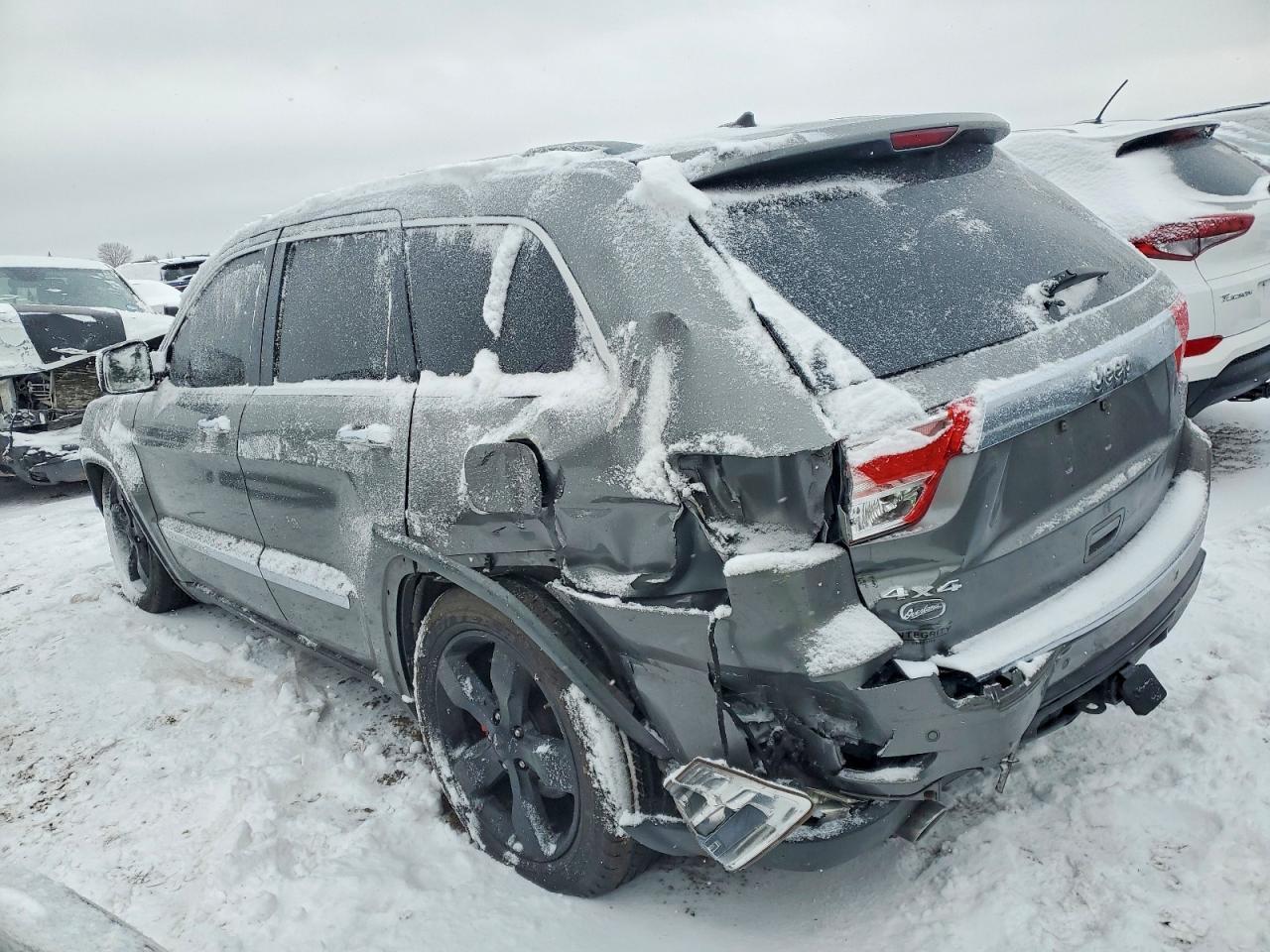 2011 Jeep Grand Cherokee Overland - Фото 2
