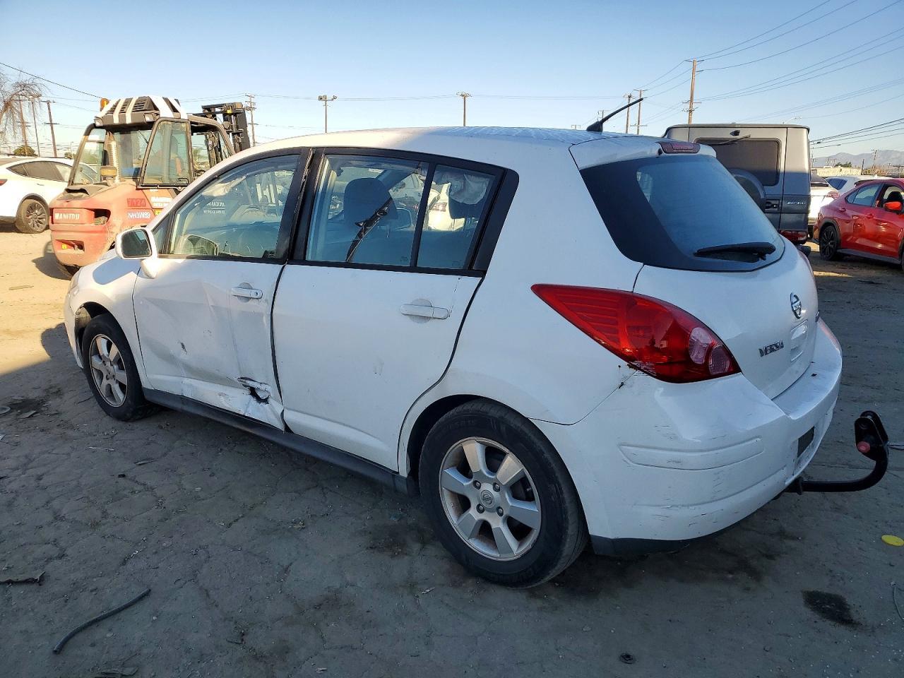 2012 Nissan Versa S - Фото 2