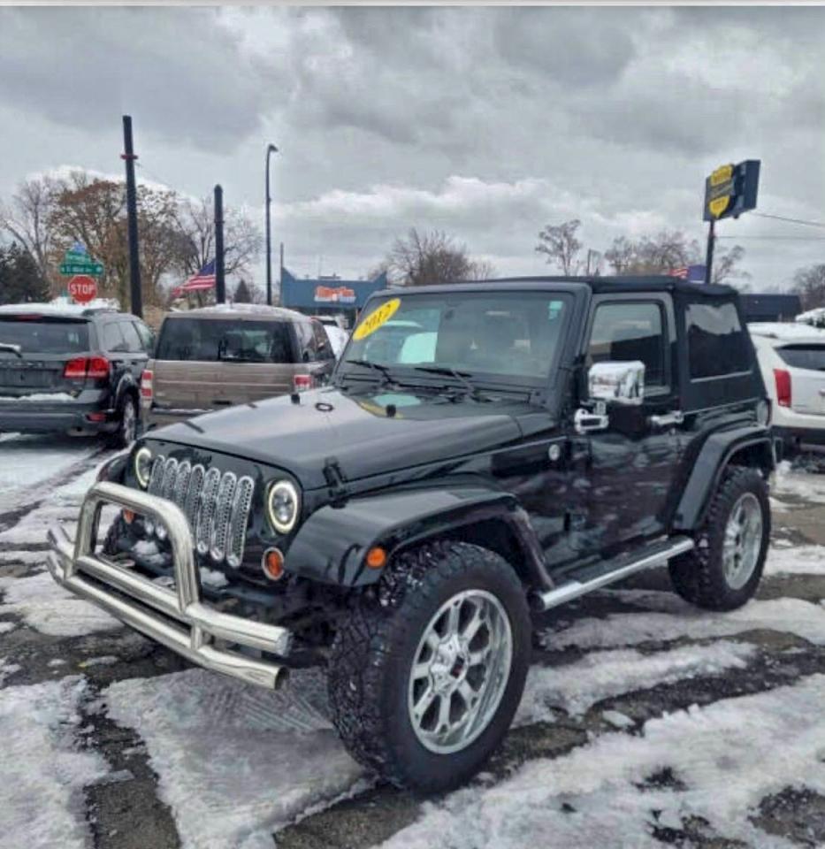 2012 Jeep Wrangler Sahara - Фото 2