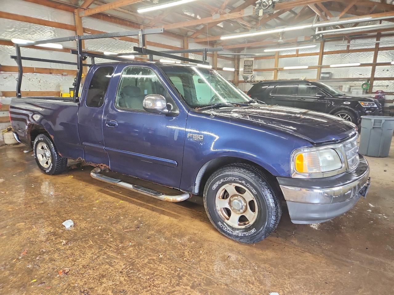 2002 Ford F150 - Фото 4